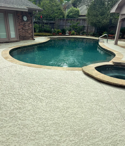 Pool with spa and decorative blue tile waterfall feature